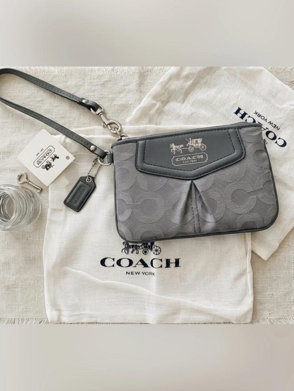 Coach Gray Signature Wristlet with Leather Trim new with tags and dustbag